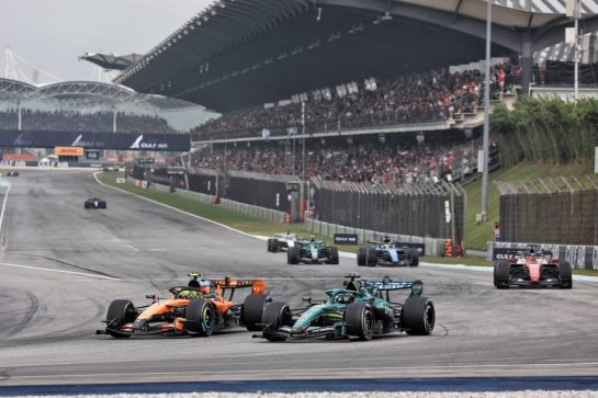 Lando Norris (GBR) McLaren F1 Team MCL40 and Lance Stroll (CDN) Aston Martin F1 Team AMR26 battle for position.
04.10.2026. Formula 1 World Championship, Rd 16, Bahrain Grand Prix, Sepang, Malaysia, Race Day.
- www.xpbimages.com, EMail: requests@xpbimages.com © Copyright: Moy / XPB Images