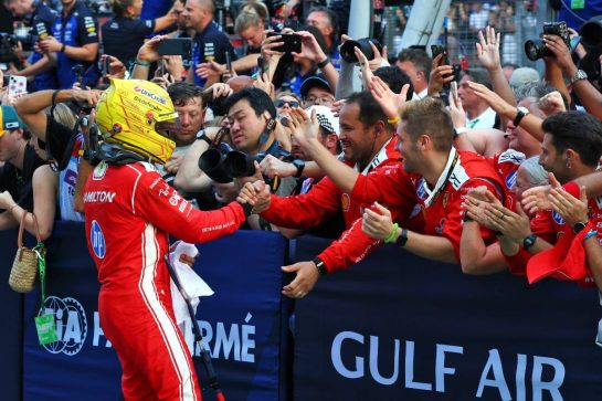 Lewis Hamilton (GBR) Scuderia Ferrari celebrates his third position with the team in parc ferme.
04.10.2026. Formula 1 World Championship, Rd 16, Bahrain Grand Prix, Sepang, Malaysia, Race Day.
- www.xpbimages.com, EMail: requests@xpbimages.com © Copyright: Bearne / XPB Images