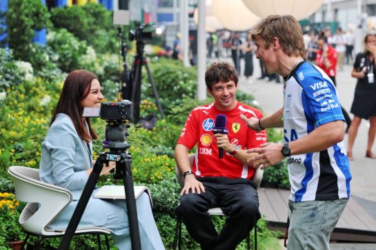 (L to R): Charles Leclerc (MON) Scuderia Ferrari with Liam Lawson (NZL) Racing Bulls Formula One Team.
08.10.2026. Formula 1 World Championship, Rd 17, Singapore Grand Prix, Marina Bay Street Circuit, Singapore, Preparations Day.
- www.xpbimages.com, EMail: requests@xpbimages.com © Copyright: Batchelor / XPB Images