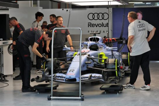 Audi F1 Team R26 being prepared by mechanics in the pit garage.
08.10.2026. Formula 1 World Championship, Rd 17, Singapore Grand Prix, Marina Bay Street Circuit, Singapore, Preparations Day.
- www.xpbimages.com, EMail: requests@xpbimages.com © Copyright: Moy / XPB Images