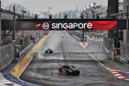 Max Verstappen (NLD) Red Bull Racing RB22 leads behind the Mercedes FIA Safety Car.
10.10.2026. Formula 1 World Championship, Rd 17, Singapore Grand Prix, Marina Bay Street Circuit, Singapore, Sprint and Qualifying.
- www.xpbimages.com, EMail: requests@xpbimages.com © Copyright: Moy / XPB Images