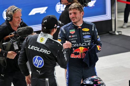 (L to R): Second placed Charles Leclerc (MON) Scuderia Ferrari with pole sitter Max Verstappen (NLD) Red Bull Racing in qualifying parc ferme.
10.10.2026. Formula 1 World Championship, Rd 17, Singapore Grand Prix, Marina Bay Street Circuit, Singapore, Sprint and Qualifying.
- www.xpbimages.com, EMail: requests@xpbimages.com © Copyright: Batchelor / XPB Images
